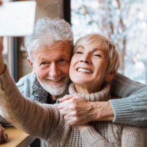 Older Couple Smiling for Picture